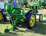 JD L with mounted corn planter